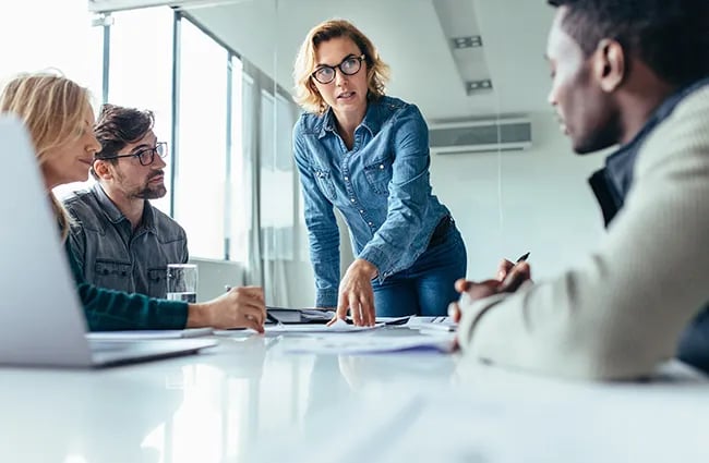 Casually worker business professionals collaborating at a conference table