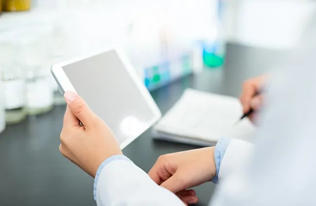 Hand holding tablet device