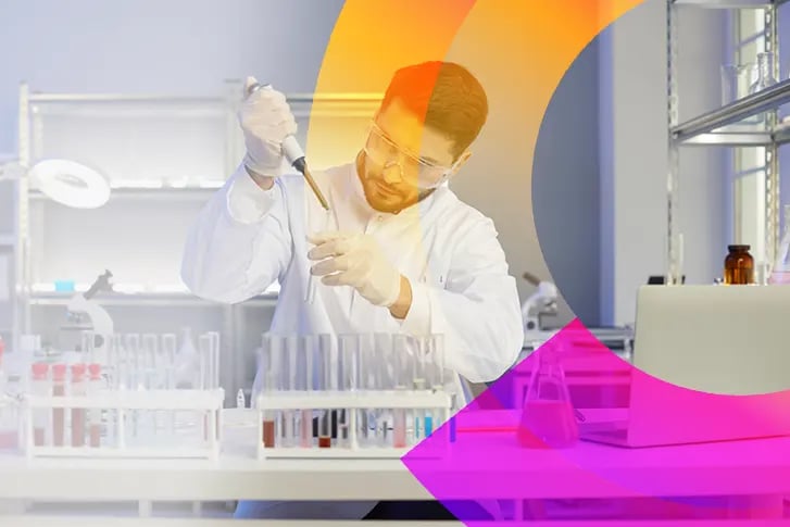 Lab technician injecting syringe into a test tube