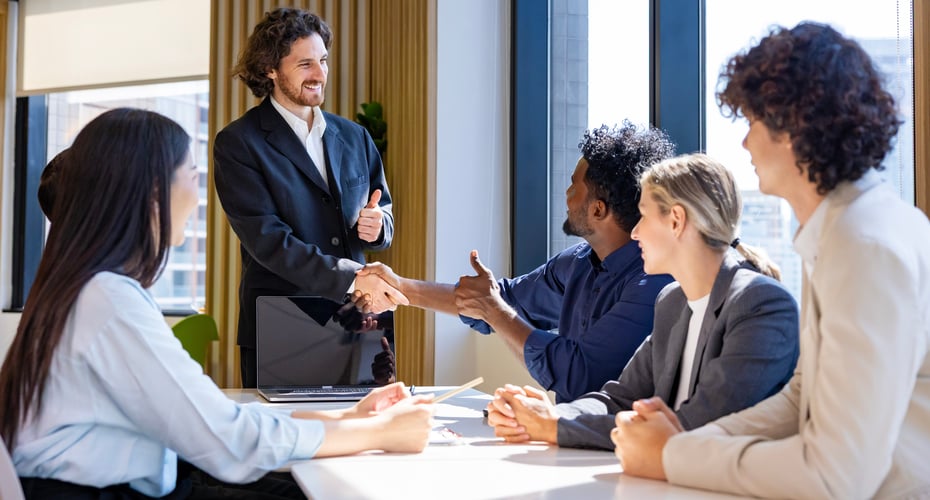professionals meeting at conference table to discuss fda submission for medical device